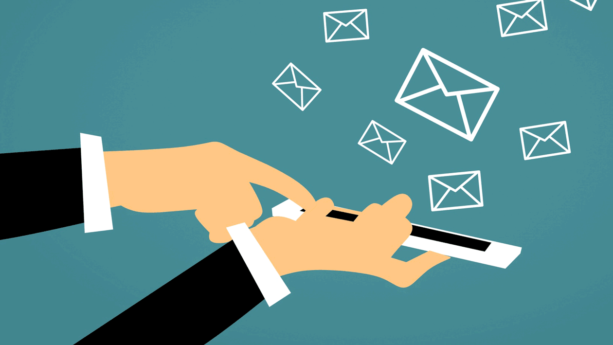 hand and phone with floating emails